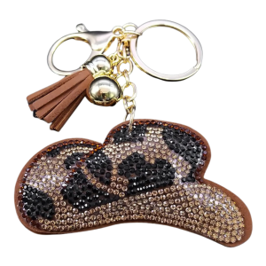 Nyckelring med strassprydd cowboyhatt med tofs och gulddetaljer